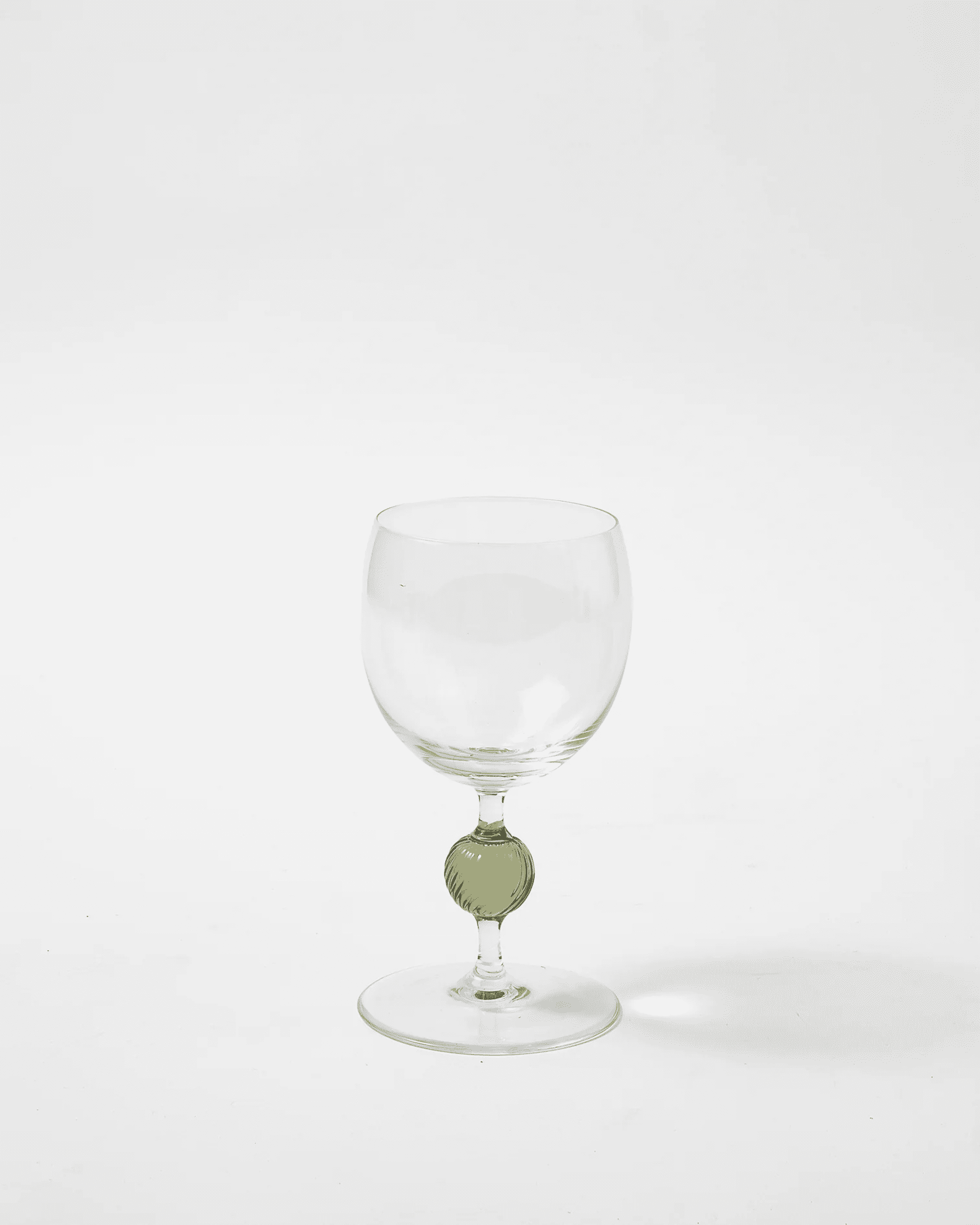 https://theinvisiblecollection.com/wp-content/uploads/2023/11/TheInivisibleCollection_Clubroom_CasaCabana_DemetraWineGlasses_1-1.png